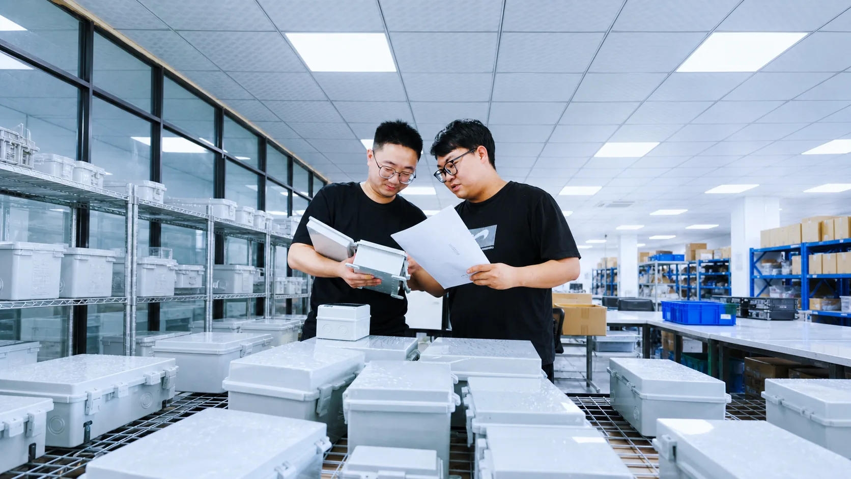 Engineers completing final enclosure inspection